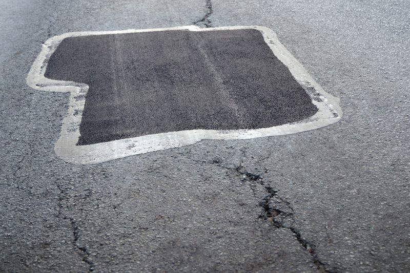Asphalt Pothole Filling in Orange County, CA